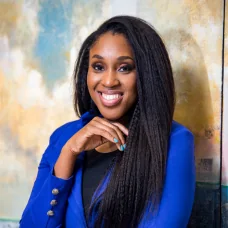 a woman in a blue jacket