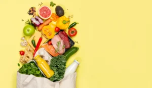 fresh foods spilling out of a grocery bag, representing a shift from food insecurity to food security