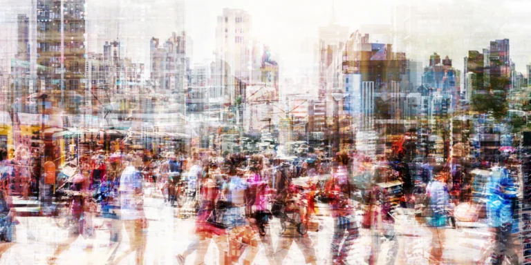 Crowd of people walking on busy city street - abstract city life concept