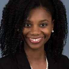 a close-up of a woman smiling