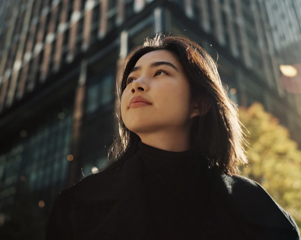 young woman walking in an urban setting