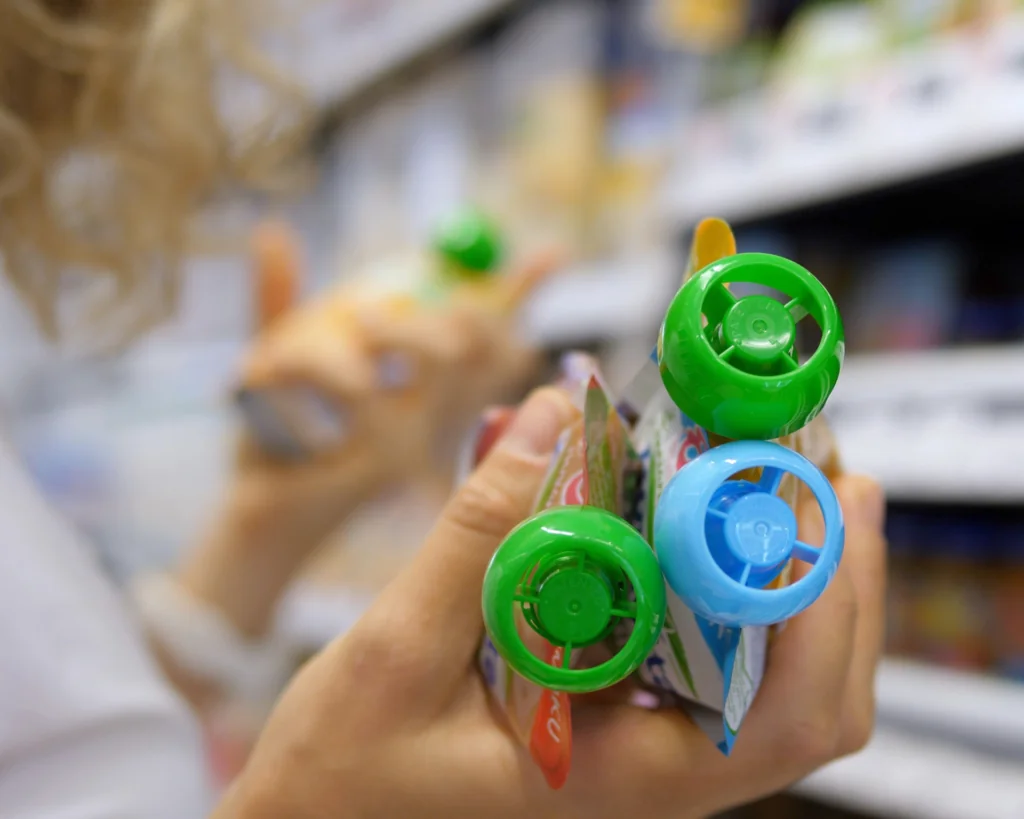 woman shopping for baby food at the grocery store