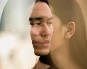 close-up portrait of a young man. disordered eating concept