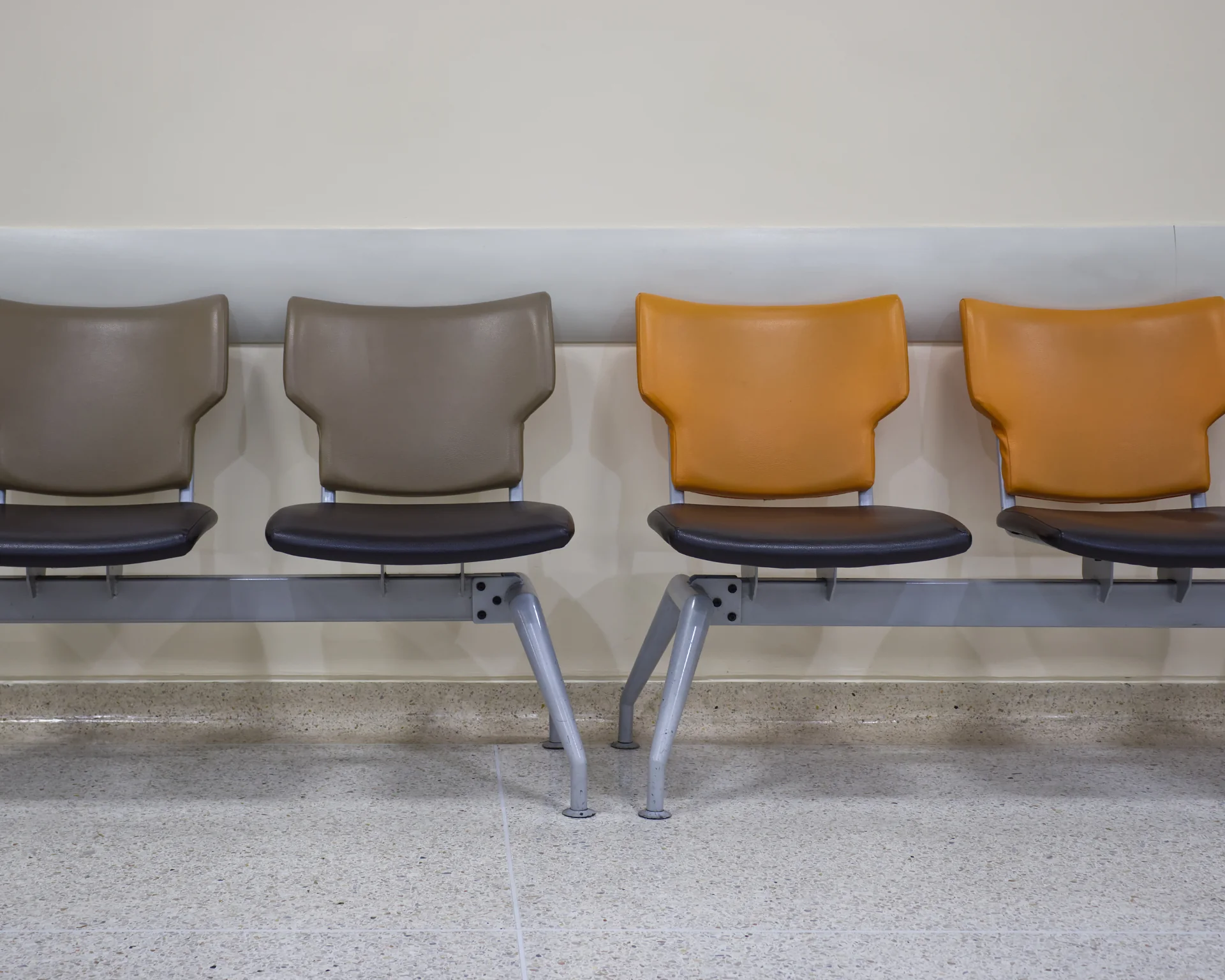 Rows of chairs for patients to sit and wait in line to get care at a health clinic