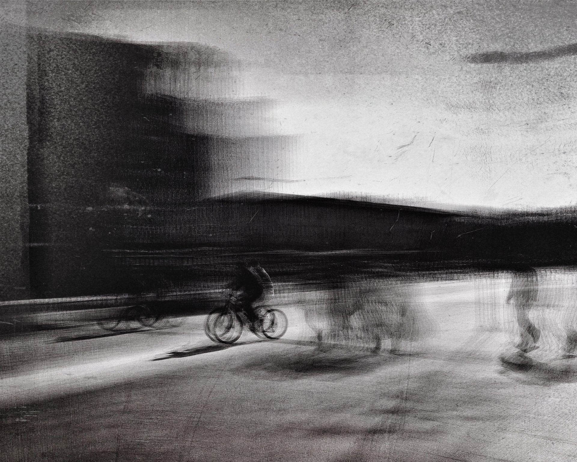 Black and white, blurred motion photo of people in the street