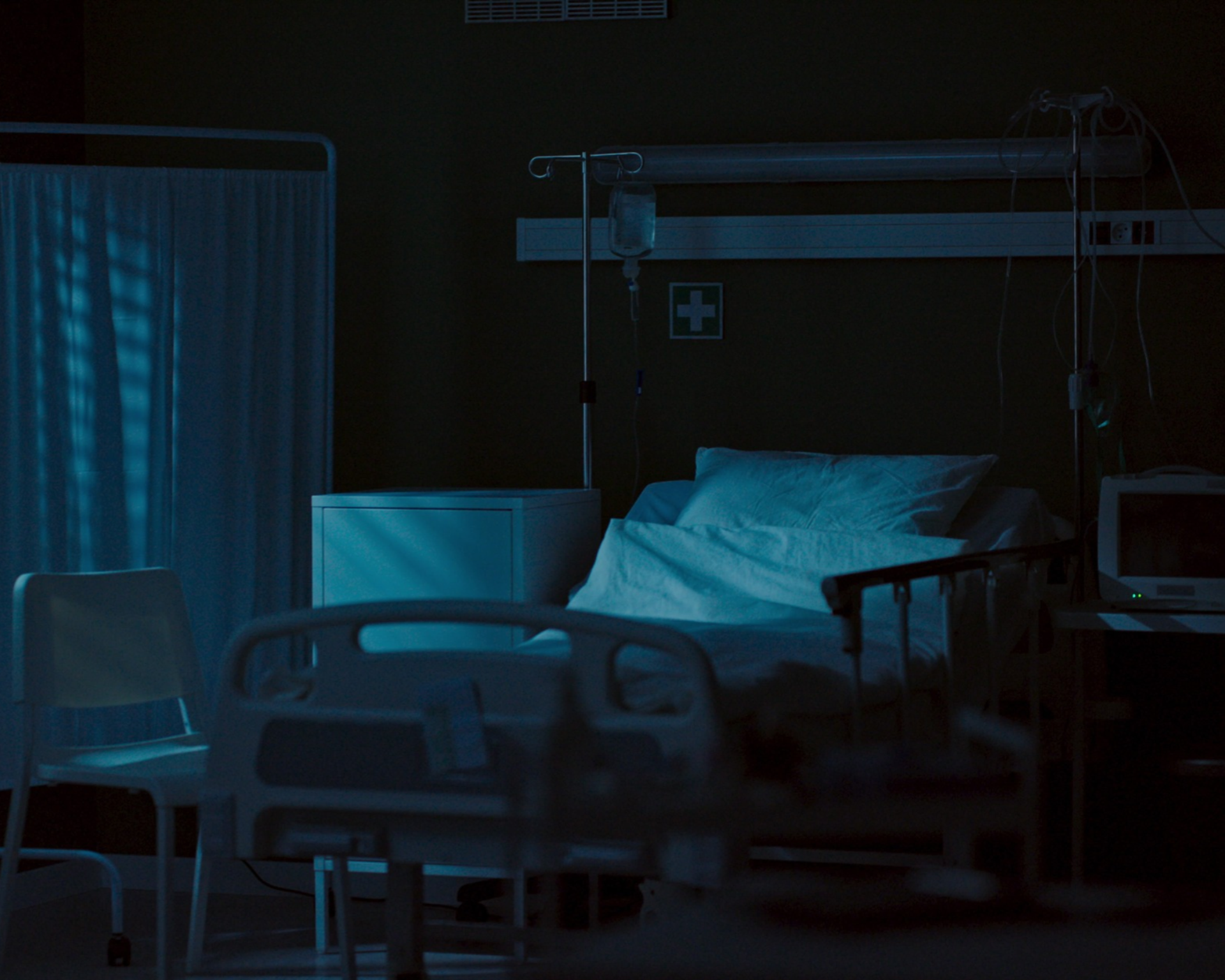 dark, empty hospital room. abortion care concept